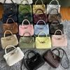 2026 New Leather Women's Bag Fashion Trendy Crocodile Pattern Stone Pattern Woven Butterfly Buckle Commuter Tote Small Bag Cross-border