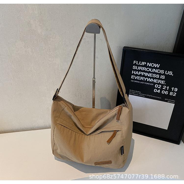 

2025 new nylon bag women s premium portable large-capacity simple tote fashion shoulder messenger bag college student хакі