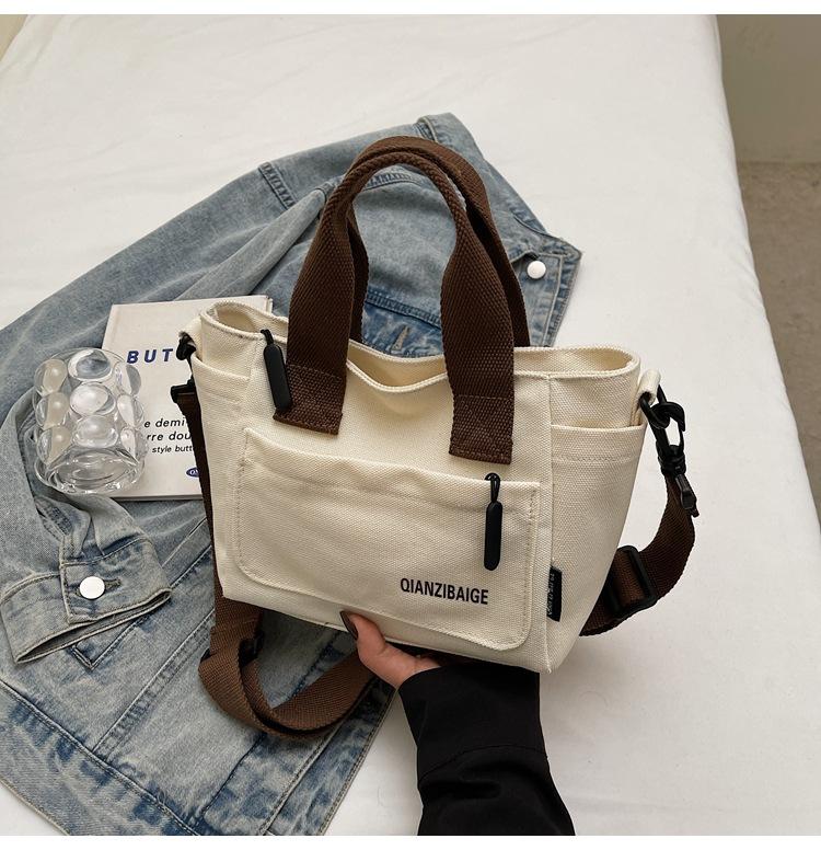 Stylish solid color simple commuter shoulder bag spring new niche casual lightweight messenger bag