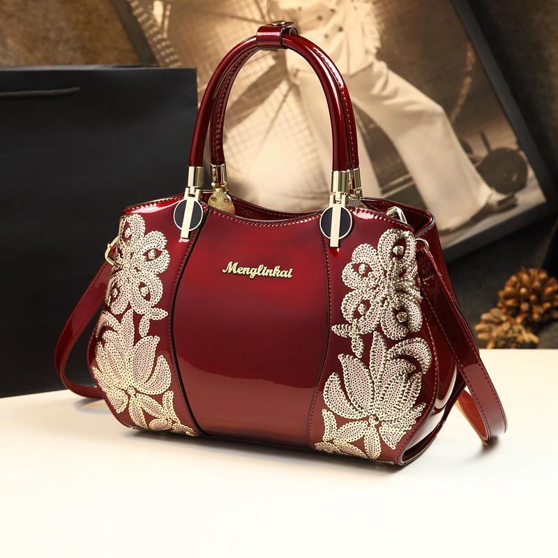 

Atmospheric Brand Women S Bag Women S Bag Shoulder Crossbody Handbag Embroidered Leather Mother Bag вина червоного кольору