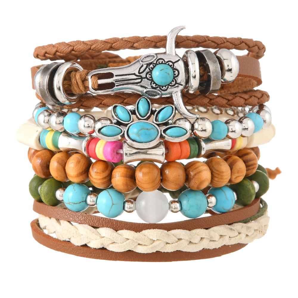 Cross-border new products European and American beaded alloy multi-layer retro bull head cat claw handwoven set bracelet
