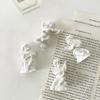 2 Pcs Mini Cupid Figurine Small Resin Cherubs Playing Musical Instrument
