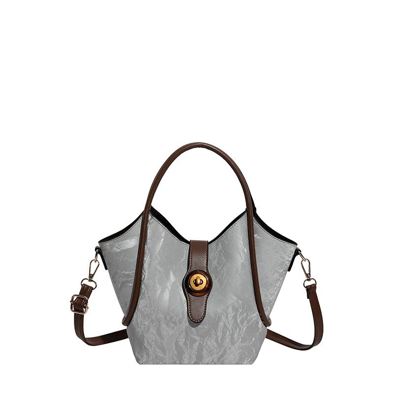 

New textured bucket bag women s largecapacity versatile handbag niche commuter bucket bag women сірий колір
