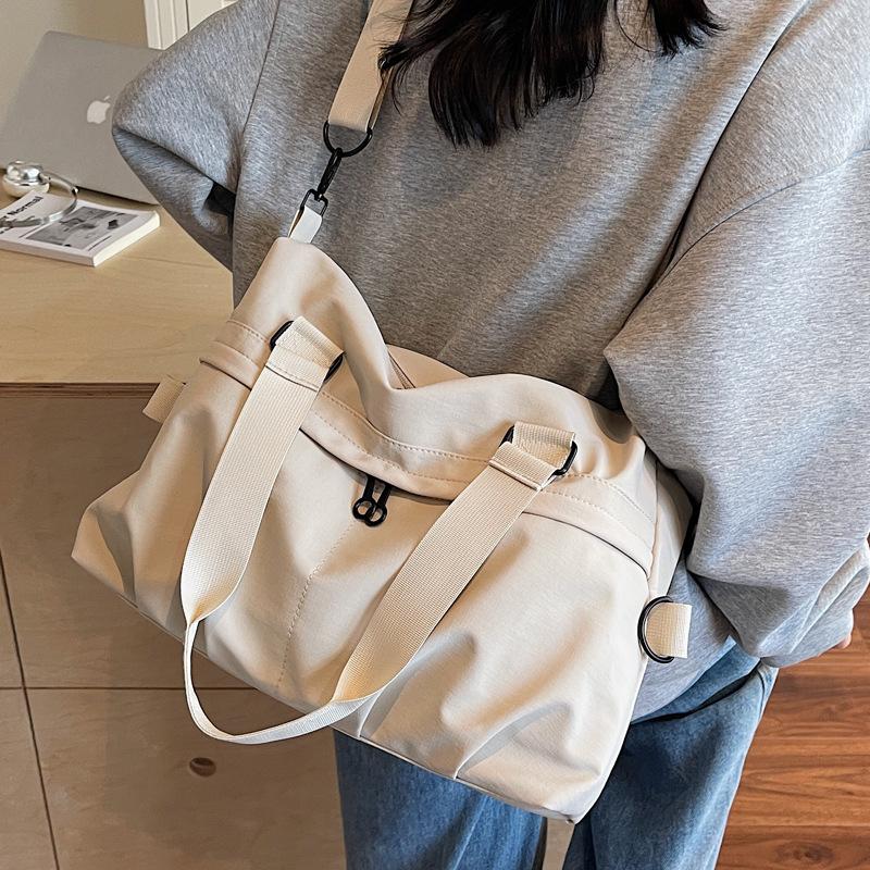 Japanese hand-held travel bags for men and women large-capacity short-distance travel cloth bags shoulder messenger bags fashion sports fitness bags