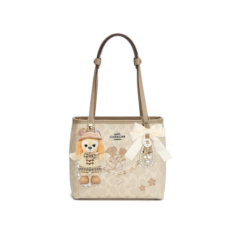 

COACH shoulder bag [Customized bag] City 23 classic presbyopic metal logo, printing, bow, doll pendant, four-leaf clover chain Jin Shu Su Basic Set золотий