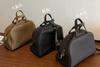 2026 New Genuine Leather Women's Bag Top Layer Cowhide Bowling Ball Large Capacity Commuting Boston Casual Single Shoulder