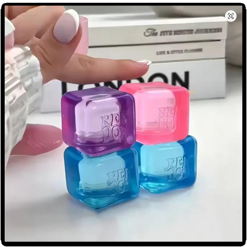 Needoh Teenie Nice Eiswürfel Fidget Spielzeug Mini 4er Pack Set Langsamer Rückprall Squishy Spielzeug Stressabbau Fidget für Partygeschenke Geschenke