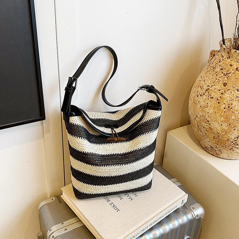 

Design sense bag women s summer contrasting color striped woven bag large capacity leisure vacation bucket bag