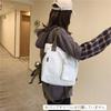 2-way vertical canvas tote bag with exterior pocket and long handles, suitable for shoulder or hand carry (white)
