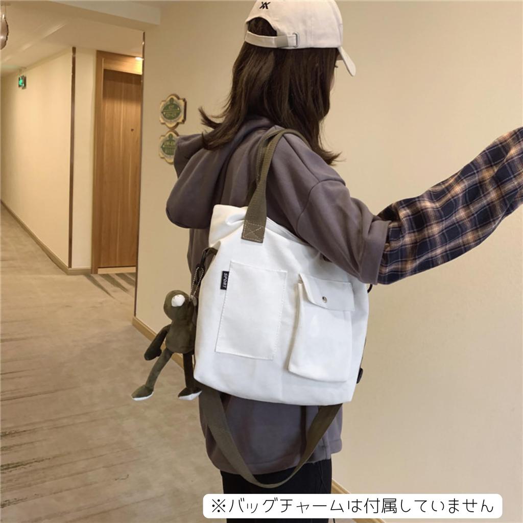 2-way vertical canvas tote bag with exterior pocket and long handles, suitable for shoulder or hand carry (white)