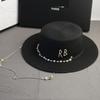Neue Damen Sommerhüte Stroh-Sonnenhut Panama Elegante Stroh-Fedora-Hüte Damen Mädchen Outdoor-Urlaub mit Perlenkette Sonnenschutz Strandhut