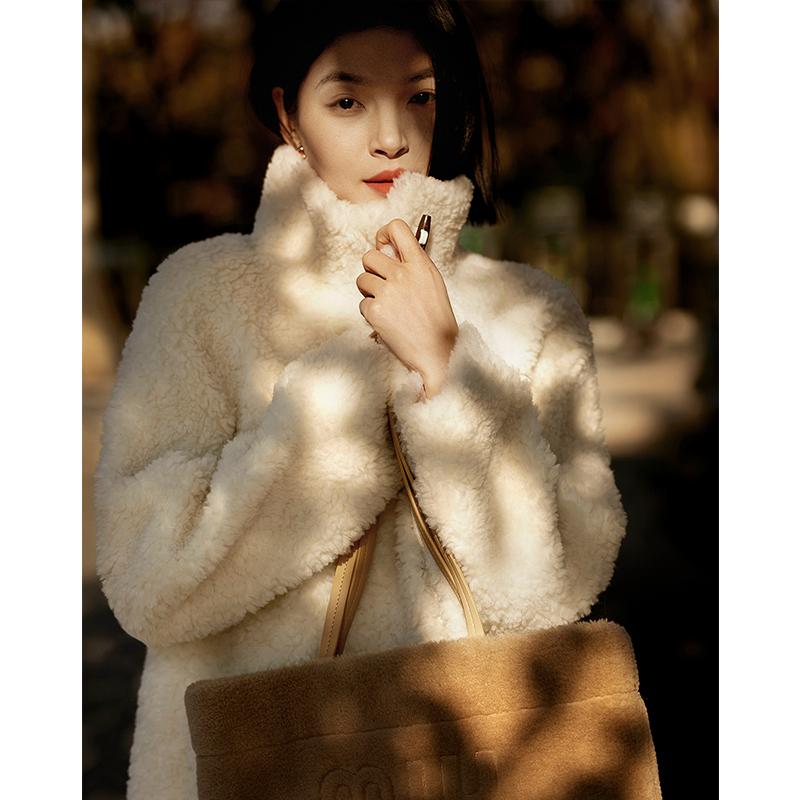 Loose Stand Collar Cow Horn Button Fur Coat