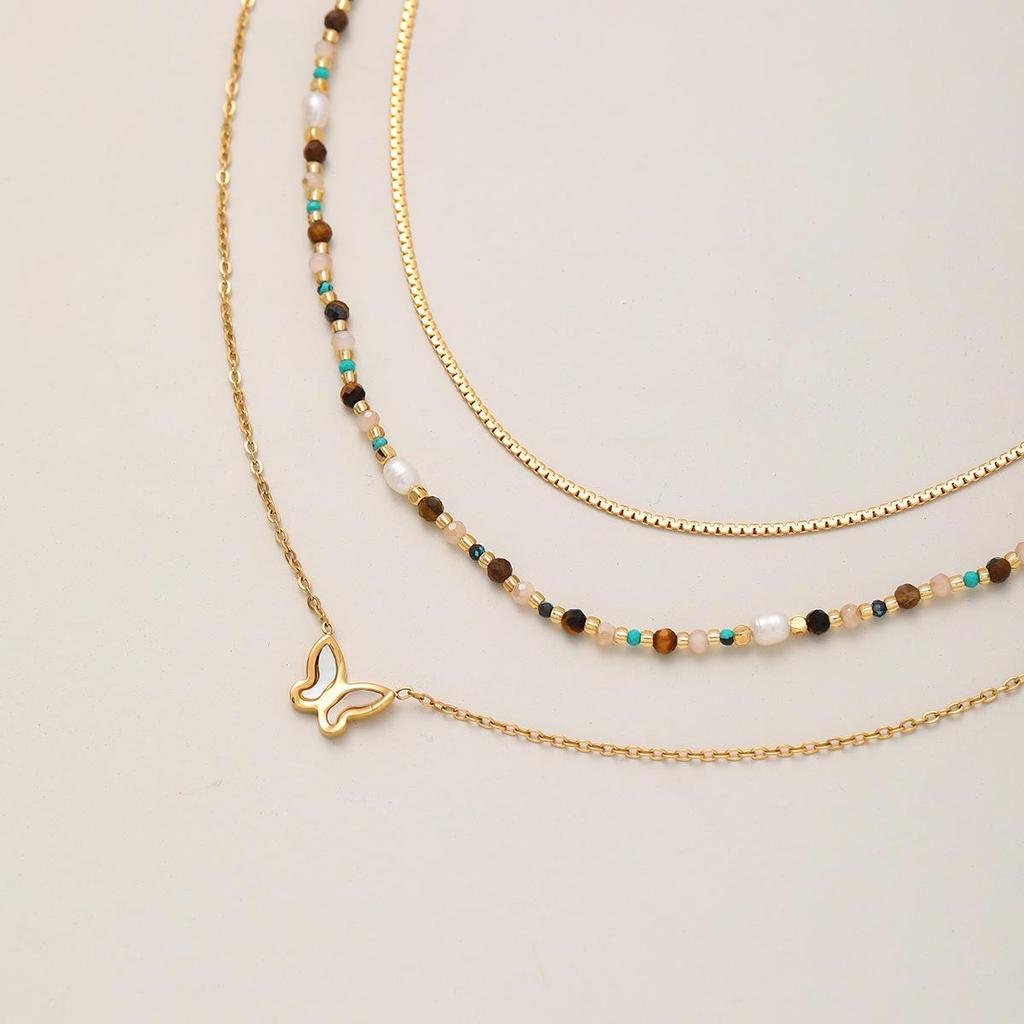 Elegant Pearl & Butterfly Pendant Necklace - Women's Titanium Steel, High-End European & American Fashion.