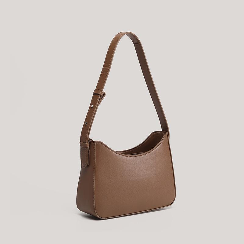 HENGJINGYX einfache Nische 2025 Achselhöhle neue französische tragbare vielseitige Schultertasche Damen-Achseltasche