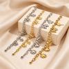 Women's European Retro Multi-Element Titanium Steel Bracelet with 18K Gold Plating and Pearl Accents
