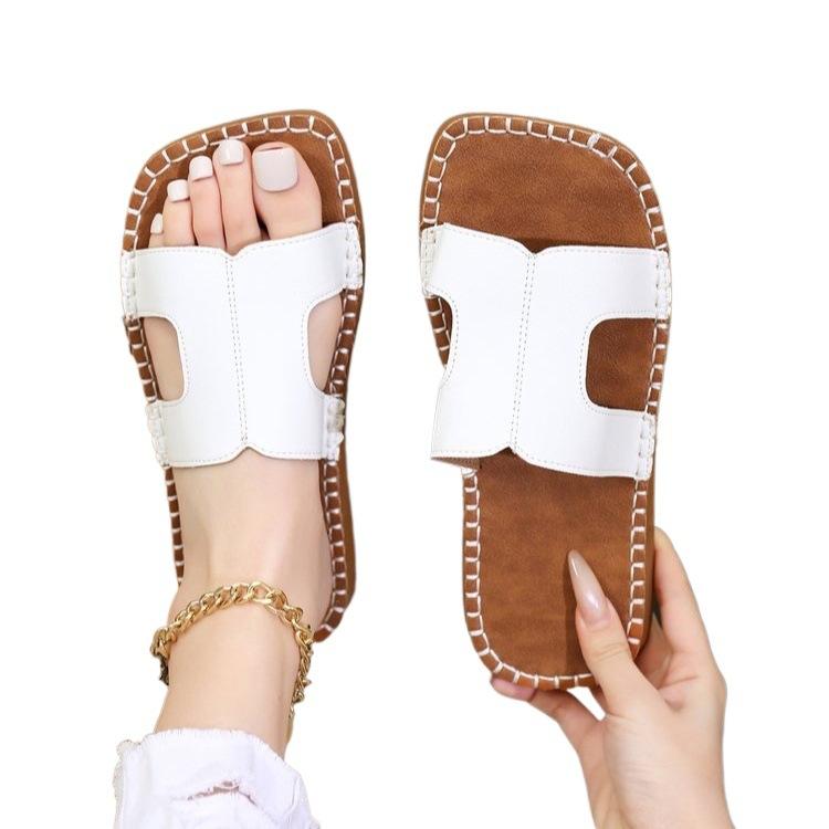 One-word drag women's shoes summer new flat-bottomed sandals outdoor wear soft-soled casual versatile beach H drag large size explosion C