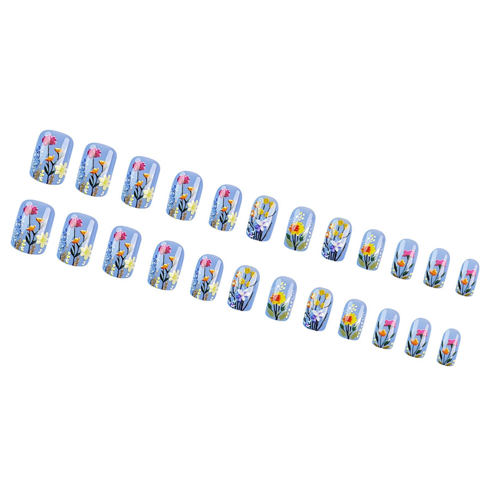 

Упаковка из 24 коротких квадратных накладных ногтей французского дизайна фиолетового цвета с глянцевым цветочным узором. Прижмите к ногтю для легкого нанесения.