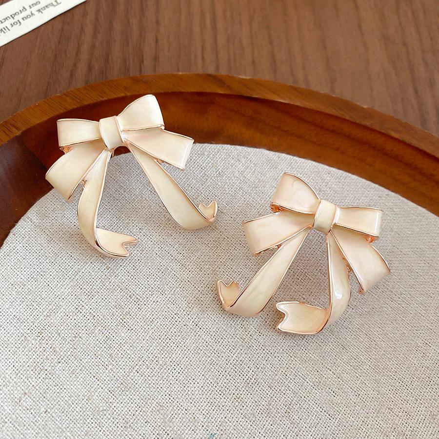 Серьги-пусеты в виде бантиков с серебряной иглой, капающее масло, милые, изысканные, элегантные и нежные серьги, нишевые серьги легкой роскоши.