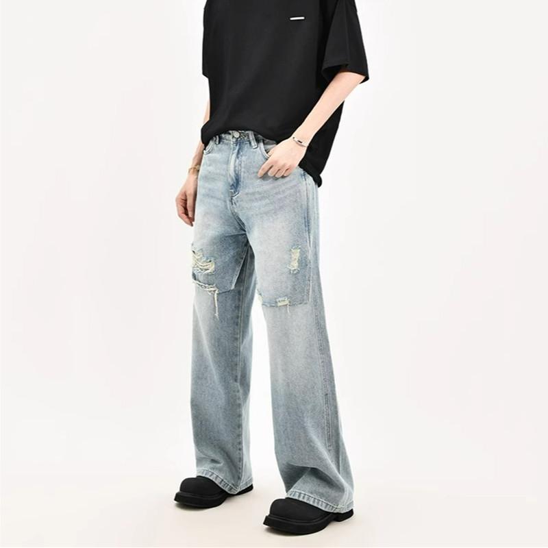 Jeans men's washing knife cuts holes loose straight handsome trousers men's casual year new wide legs