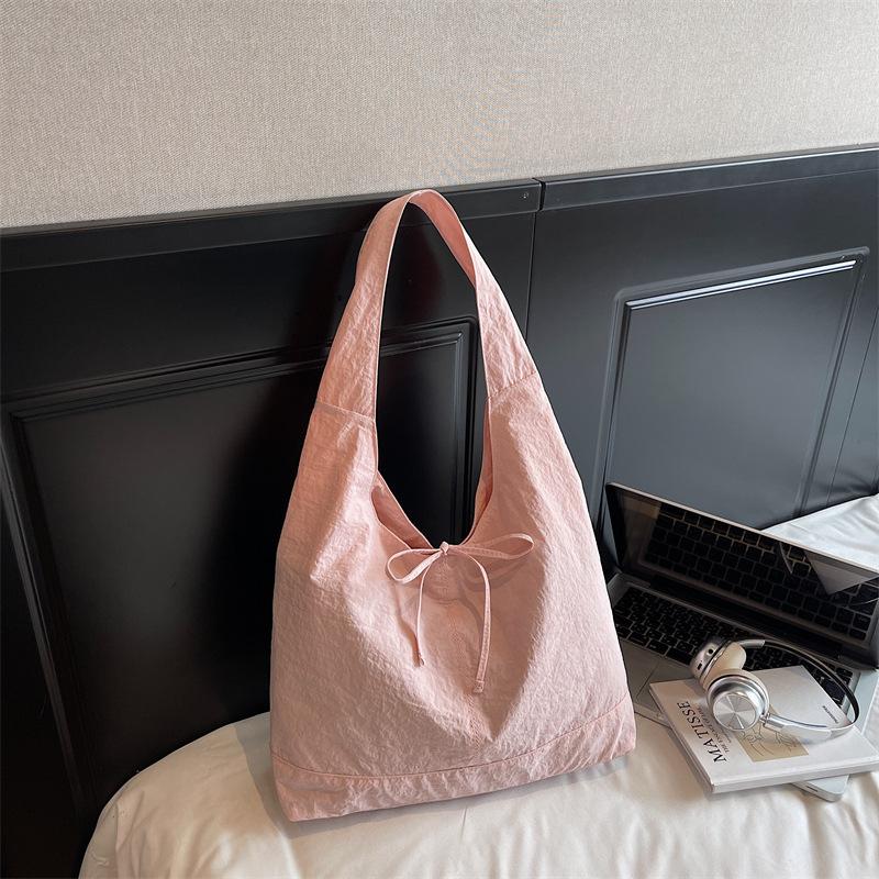 

Crossbody Japanese and Korean lazy wind washed canvas bag large capacity crossbody bag literary and artistic youth solid color men s and women s comm no pendant рожевий