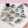 Stylish Korean Cow Print Hair Clips Set Featuring Handcrafted Hollow Design For Women