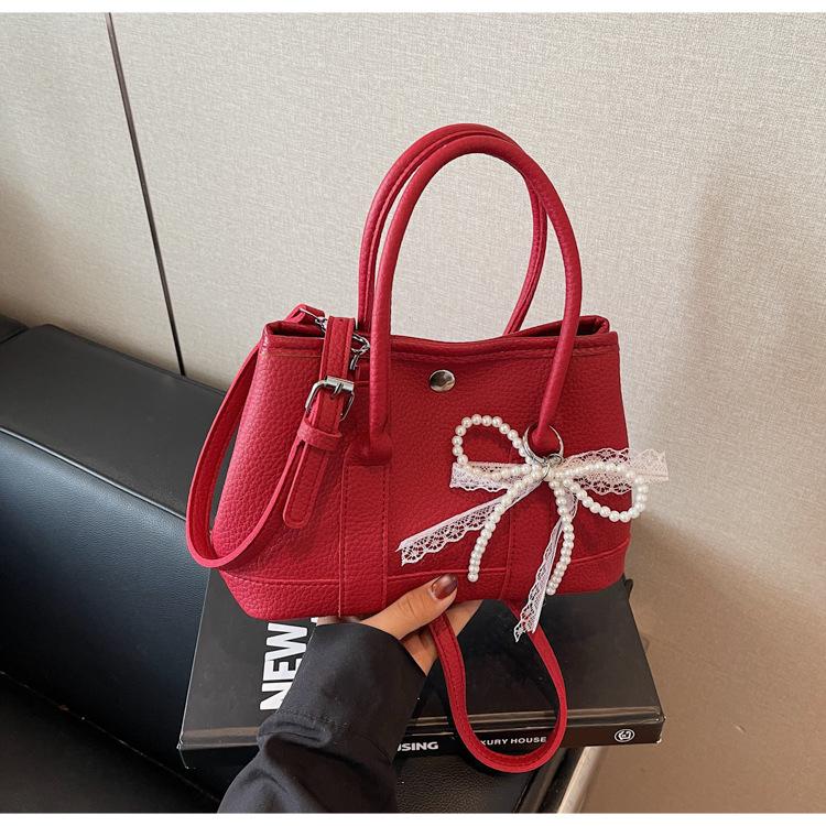 Niche design bags, new summer versatile messenger bags, popular portable bucket bags today