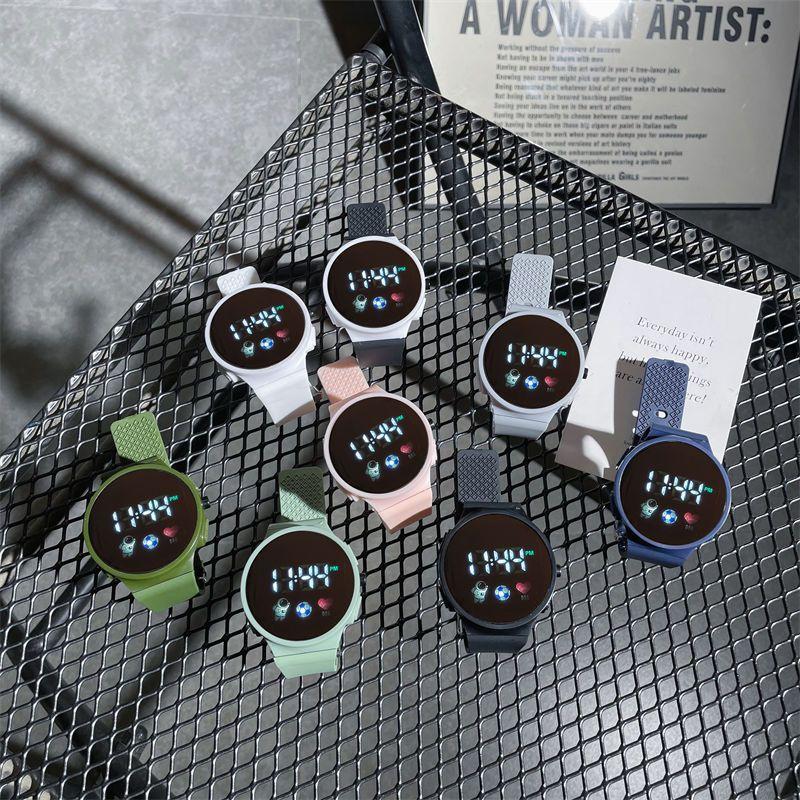 Popular And Stylish Round Electronic Watch For Children With Space Man Design High Tech And Trendy