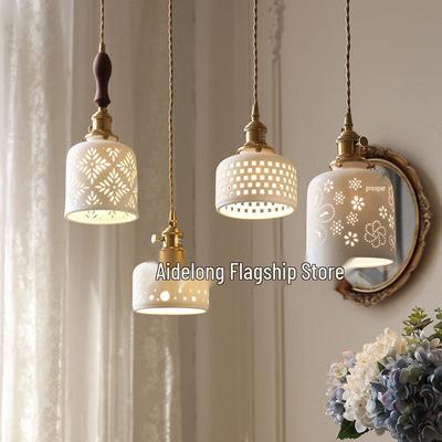 Used Creamy Ceramic Pendant Lamp for Bedside, Bar Counter, Restaurant, Homestay, or Home Decor with Brass Finish.