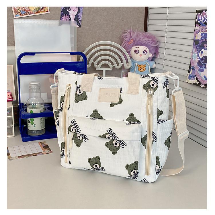 

Стильная холщовая сумка-тоут большого размера с корейским мультяшным принтом для женщин-студенток в зеленом, розовом, хаки, черном цвете зелёный