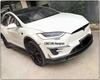 Tesla Model X RZ Carbon Fiber Body Kit: Front Lip, Modified Bumper, Rear Lip, Side Skirts.