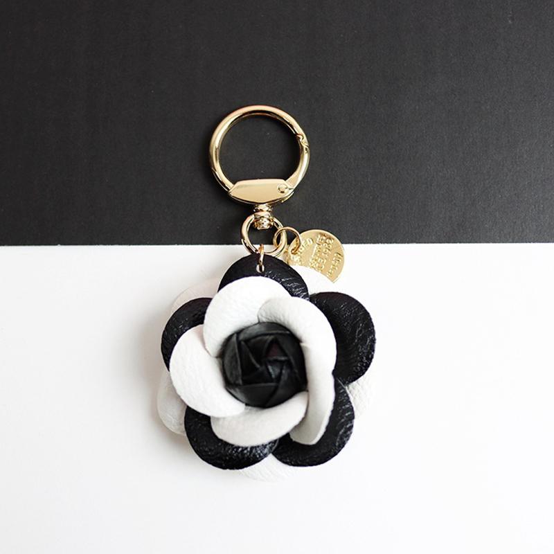 Yogodlns Cute Sweet Synthetic PU Leather Rose Camellia Flowers Bag Pendant For Women Trinket Key Chains Ring Car Bag Charm
