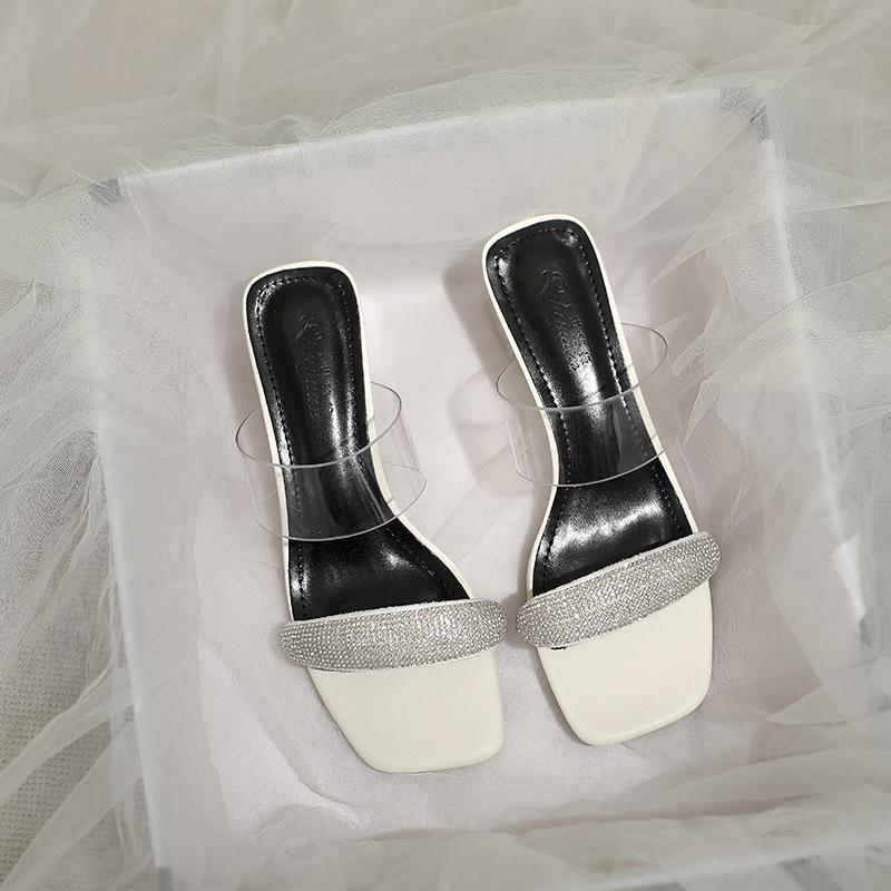 

Шлепанцы женские модные 2025 новые летние женские туфли средний каблук толстый каблук кристальные прозрачные с надписью женские крутые шлепанцы 39