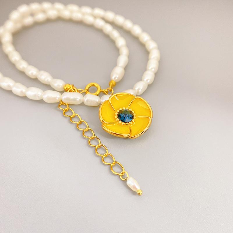 Meier Enamel sunflower pendant necklace with cultured pearl chain - a stylish and elegant statement piece