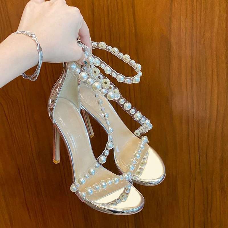 

Pearl transparent sandals women s 2025 new summer versatile rear zipper star with the same stiletto one-word strap high heels 39