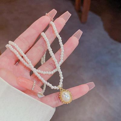 Korean Trendy Double-Layer Pearl Necklace - Elegant, Versatile, Light Luxury Clavicle Chain for Women