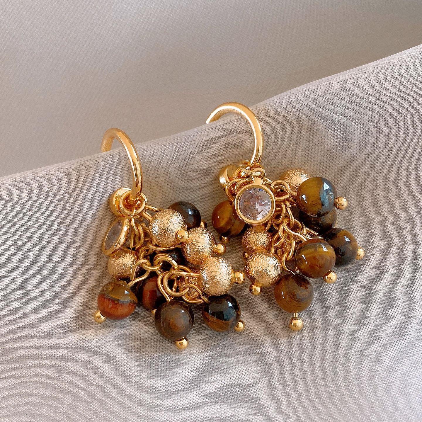 

European and American retro zircon tiger s eye stone round fringed earrings sense earrings Maillard earrings women