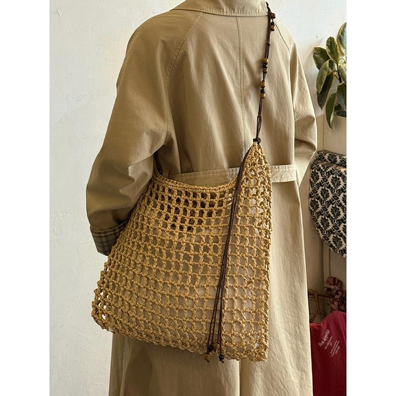Sommerurlaub Premium Strohtasche handgewebt Pendler Tragetasche große Kapazität hohl Schulter Umhängetasche