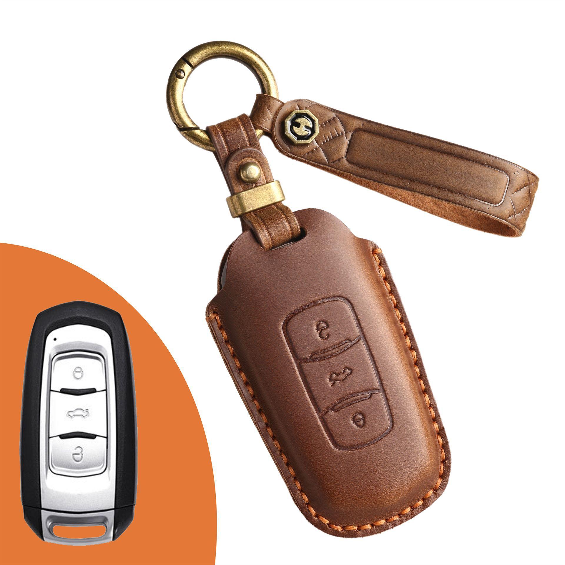

The new retro key cover is suitable for the old Geely car real cowhide pure handmade key protection case ring. коричневий