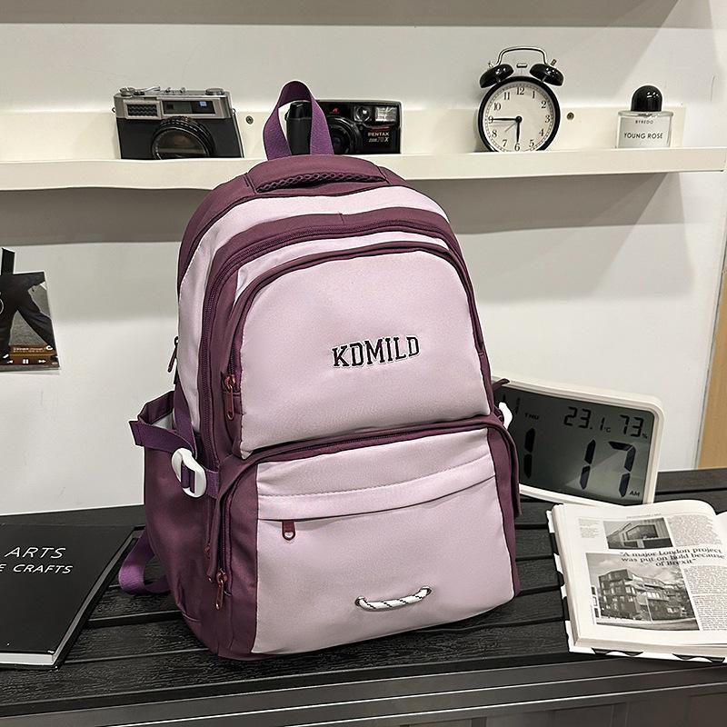 

Школьный рюкзак Альпинизм на открытом воздухе Легкий путешествия Женский средняя школа Большая вместимость пара Компьютерная спина Мужской фиолетовый