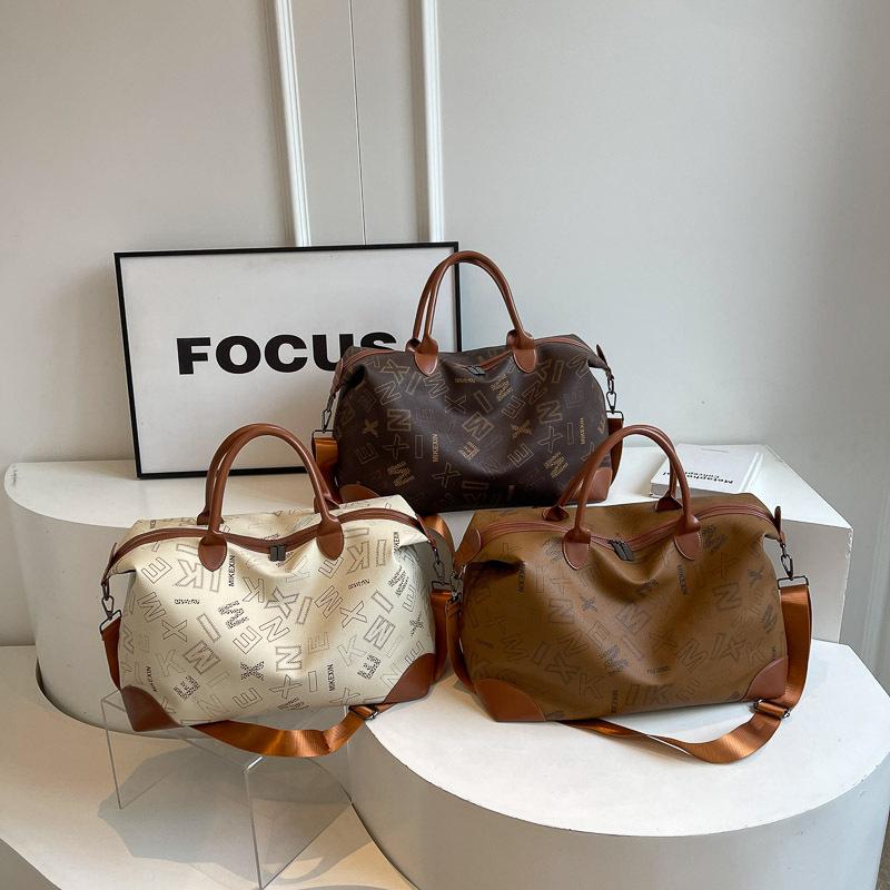 New large-capacity pu premium travel bag business travel bag women's fashion simple storage messenger fitness bag