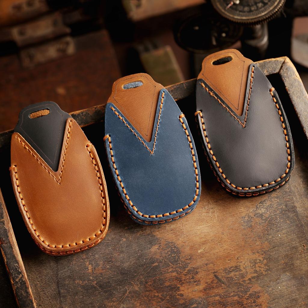 The first layer of cowhide car key cover is suitable for Geely Emgrand gs Xingyue Boyue Xingrui icon Colorful Vision leather