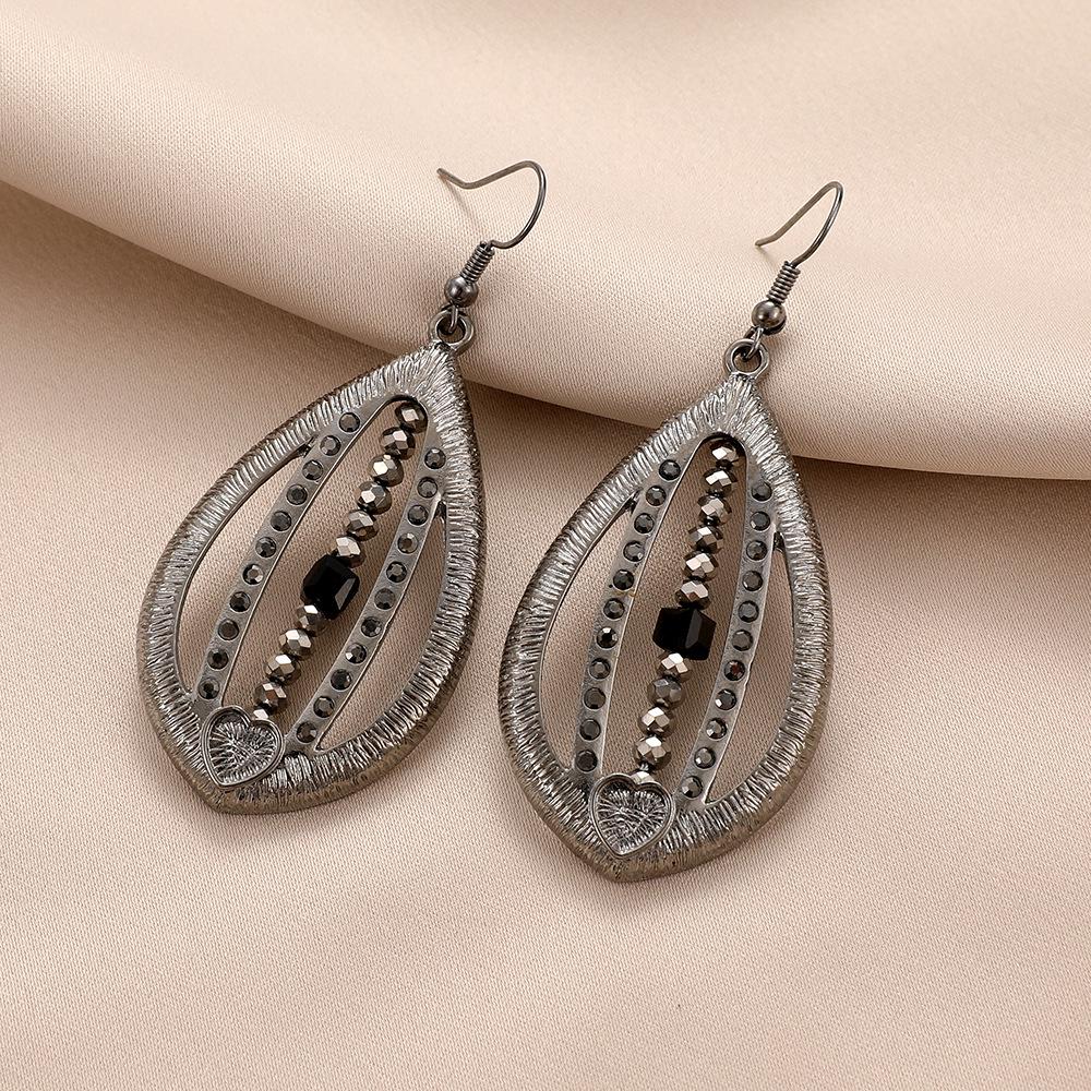 

Hollow Alloy Diamond Inlaid Beaded Teardrop Earrings for Women