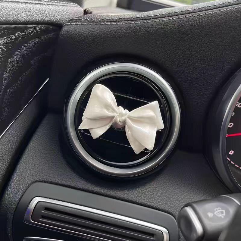 

Freshener Diffuser Stone with Lily of the Valley Design, High-End Ornament, Fragrance for Car Interior Decoration, Car Air Conditioning Vent Perfume Bow Tie (Comes with Aromatherapy Essential Oil)