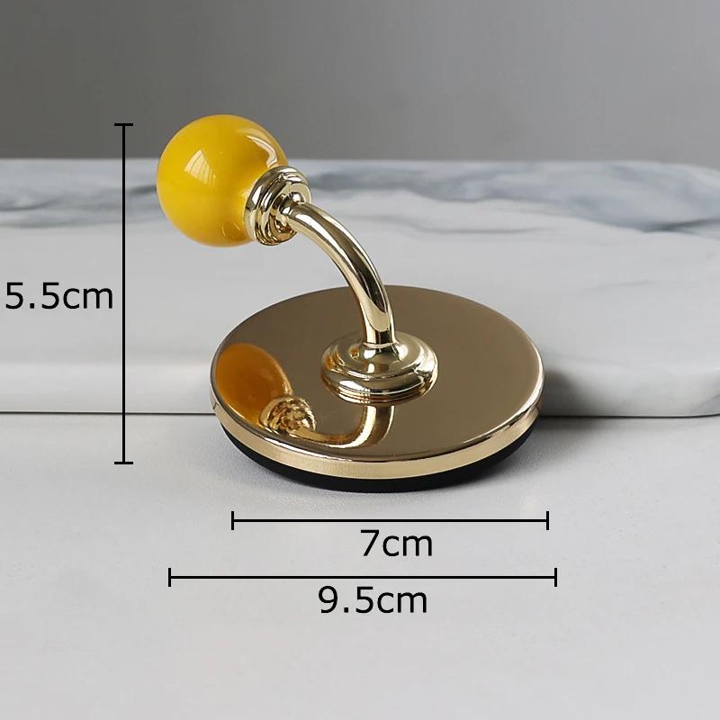 

Золотой изогнутый крючок Крючки для одежды и шляп Настенное хранилище Подвесные крючки Цветной настенный держатель для хранения Декоративные полки 1 pcs жёлтый