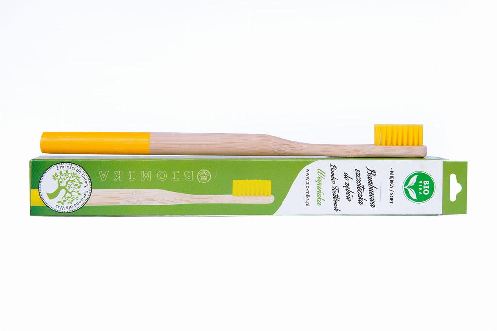 Yellow bamboo toothbrush with medium bristles Biomika