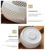 White Porcelain Tea Set with Black Ceramic Stove and Candle Base
