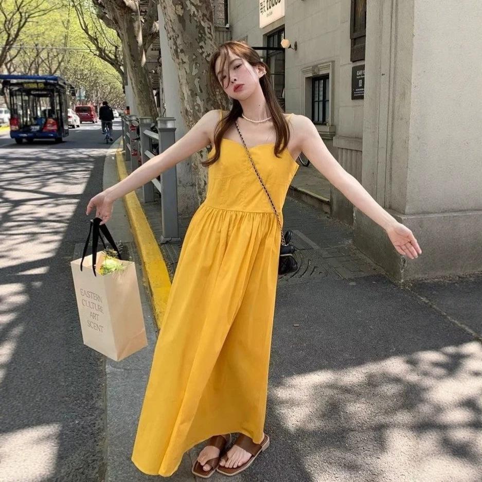 Yunnan, Xinjiang Seaside Vacation Travel Wear Photo Yellow Suspender Is Very Beautiful Pinch Waist Thin Dress Summer