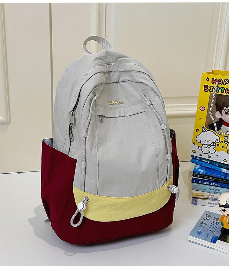School bag: new girls' backpack, travel-friendly, lightweight, stylish versatile backpack, high-end color-block patchwork, fresh little schoolbag