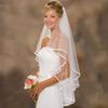 Zweilagiger Hochzeitsschleier mit Bandkante und Kamm. Elegantes Brautaccessoire für stimmungsvolle, festliche Anlässe