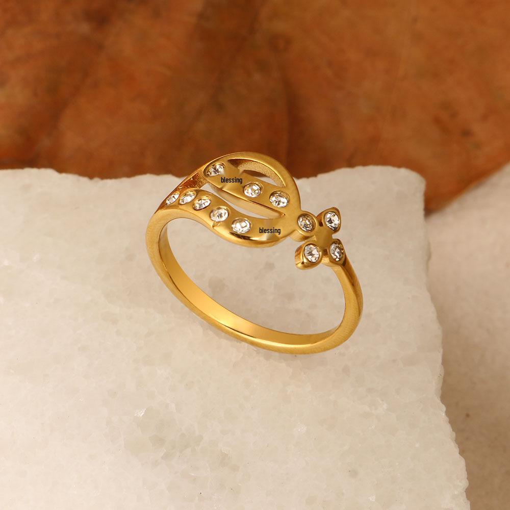 18K Gold-Plated Sparkling Four-Leaf Clover Diamond Titanium Steel Ring - Fashionable, Casual Women's Jewelry, Simple Middle Finger Design.